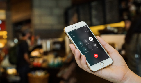 How to do a three way call on iPhone?