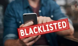 What does it mean when a phone is blacklisted - A man holding Blacklisted mobile.