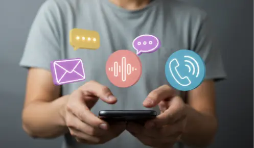 A Man Using Unified Messaging Feature In His Mobile Phone. (Graphical Representation Of Unified Messaging Features)