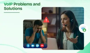 Man And Woman Wearing Headsets Looking At A Computer Screen Discussing VoIP Problems And Solutions